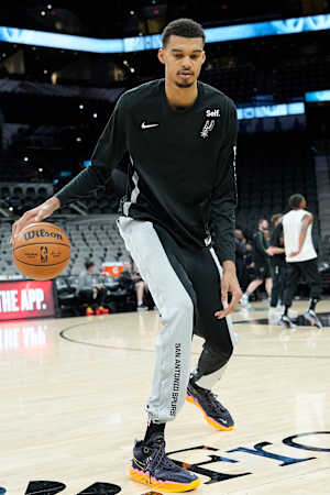 Jan 4, 2024; San Antonio, Texas, USA; San Antonio Spurs forward Victor Wembanyama (1) warms up before a game against the Milwaukee Bucks at Frost Bank Center.
